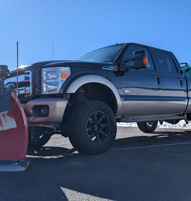 Red Beard's plow truck with blade lowered